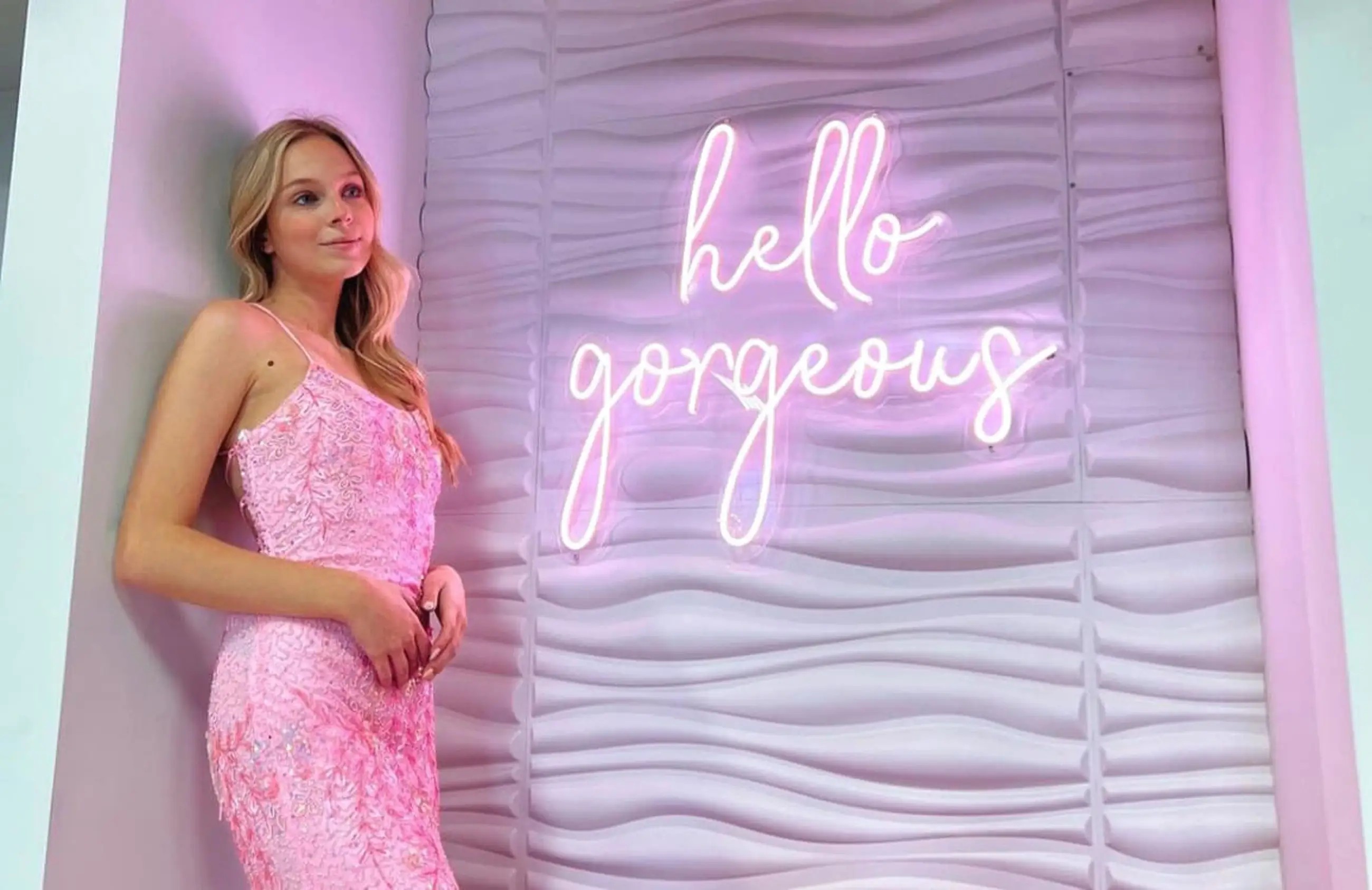 Model wearing a pink dress